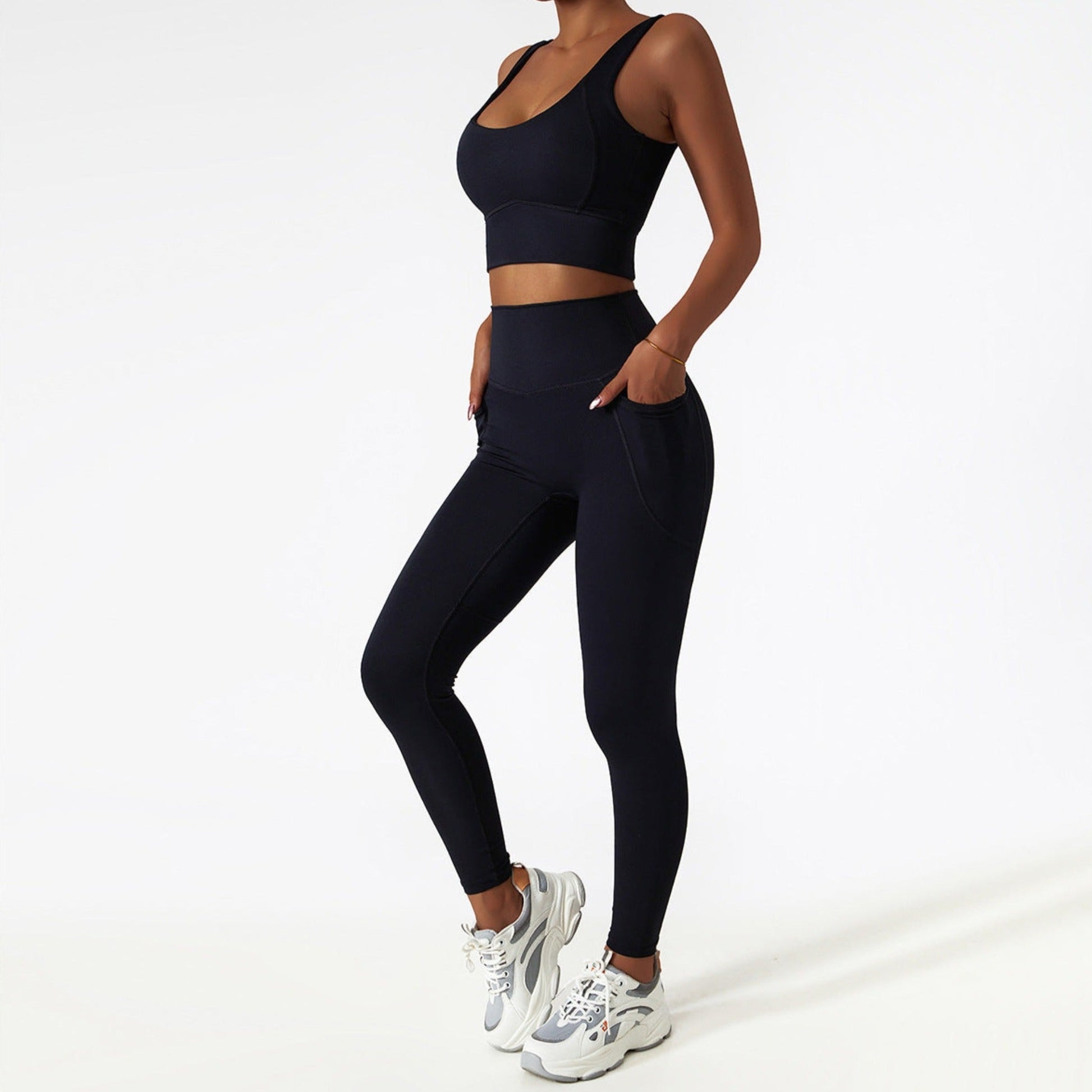 Fitness model wearing a black Chloe Set from Vibras Activewear.