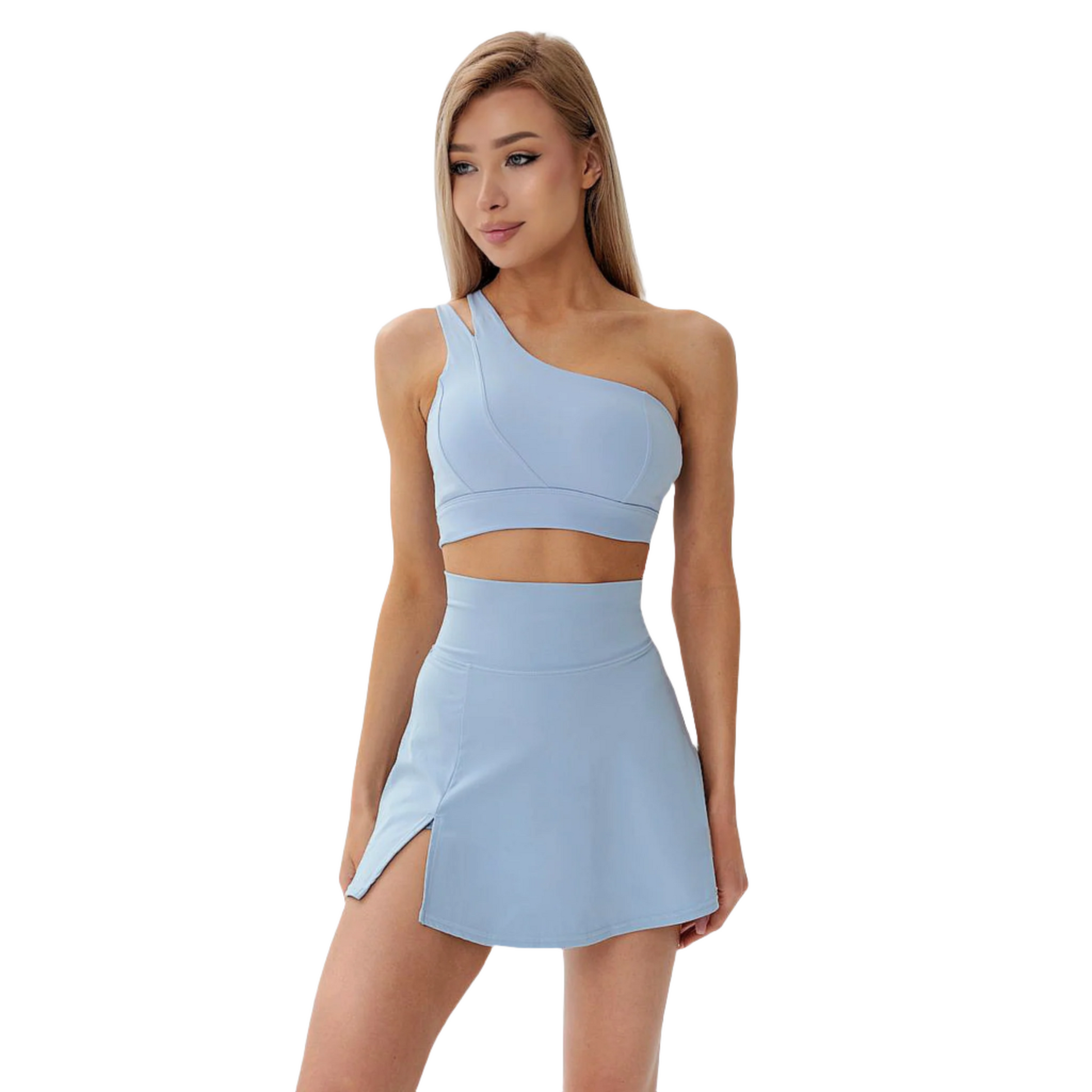 Fitness model wearing the emiliana matching skort set in baby blue from Vibras activewear.