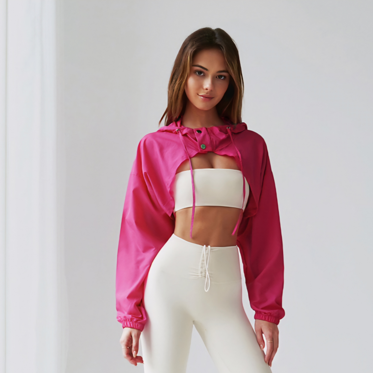 Fitness model wearing a hot pink Ella jacket from Vibras Activewear.