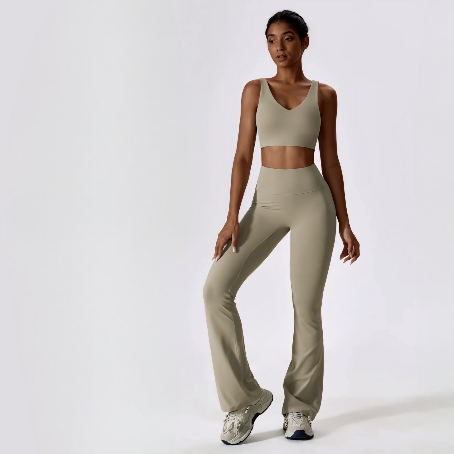 Fitness model posing and wearing the beautiful, squat proof, and butt lifting Natalia set in the colour oatmeal from Vibras Activewear.