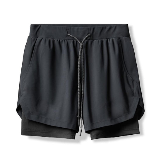 a pair of black elijah gym shorts with liner underneath on a white background